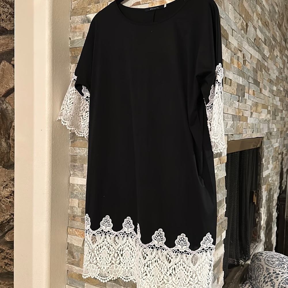 Black dress with white lace